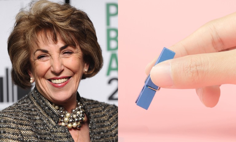 Edwina Currie and fingers holding a clothes peg