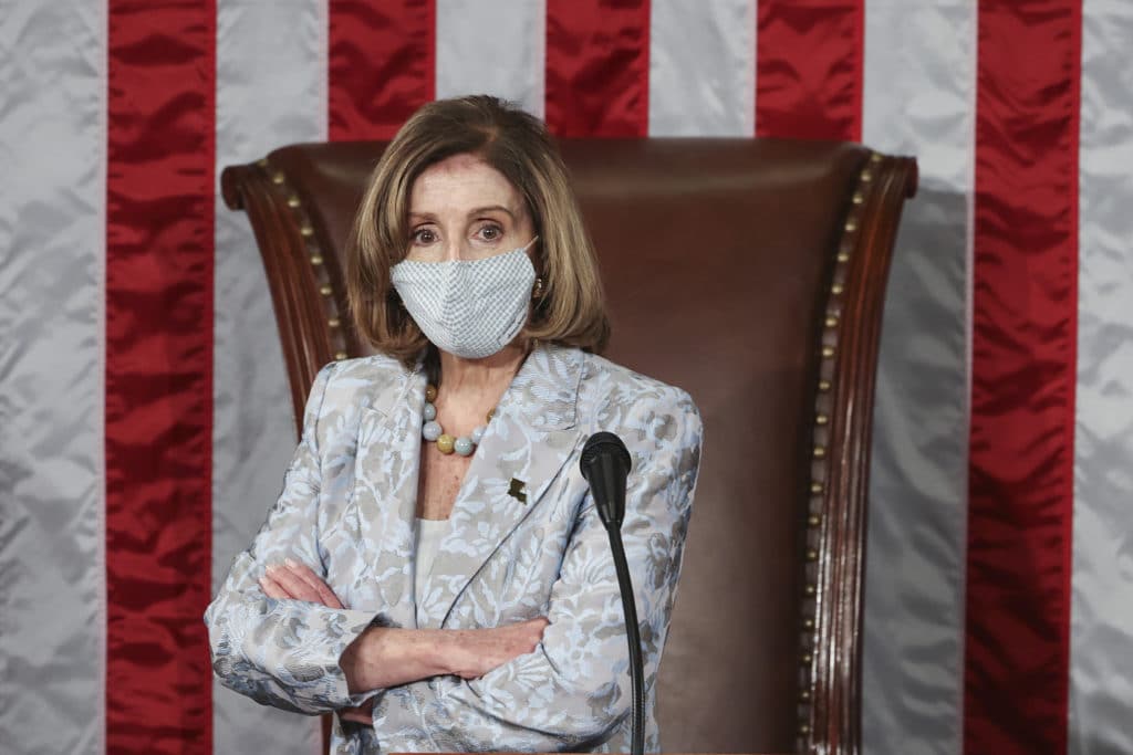 Speaker of the House Nancy Pelosi waits during votes in the first session of the 117th Congress
