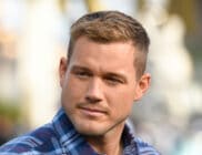 Colton Underwood pensively stares to his right