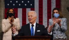 President Joe Biden addresses a joint session of Congress, with vice president Kamala Harris (L) and House speaker Nancy Pelosi (R) on the dais