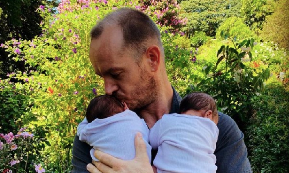 Phillip Lühl and his twin daughters in South Africa