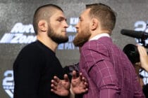 Retired UFC lightweight champion Khabib Nurmagomedov (L) and Conor McGregor (R) face off after the UFC 229 press conference