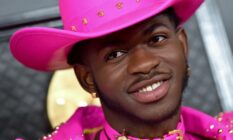 Lil Nas X wearing a hot pink outfit as he attends the 62nd Annual GRAMMY Awards