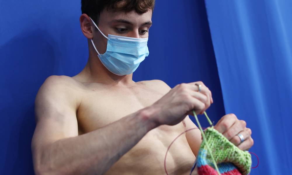 Team GB's Tom Daley is seen knitting before the Men's 10m Platform Final 2020 Tokyo Games