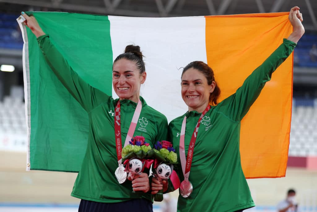 Silver medalists Katie-George Dunlevy and pilot Eve McCrystal of Team Ireland pose during the women's B 3000m Individual pursuit track cycling medal ceremony on day 4 of the Tokyo 2020 Paralympic Games at Izu Velodrome on August 28, 2021 in Izu, Japan.