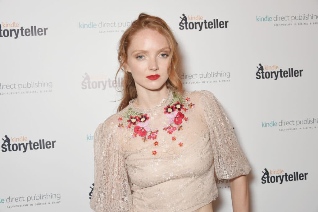 Lily Cole in a white dress on the red carpet