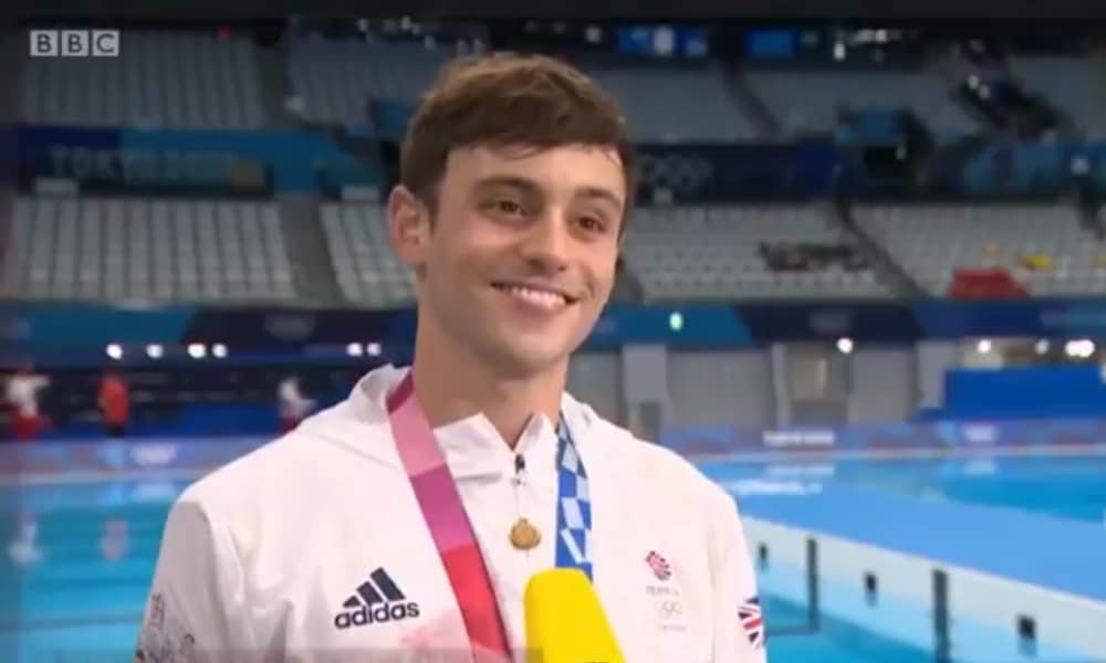 Tom Daley with his Olympic medal round his neck