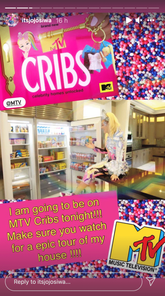 A picture of JoJo Siwa in the kitchen of her mansion to promote her appearance on MTV Cribs