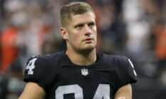 Carl Nassib exits the field after the Las Vegas Raiders lost to the Chicago Bears