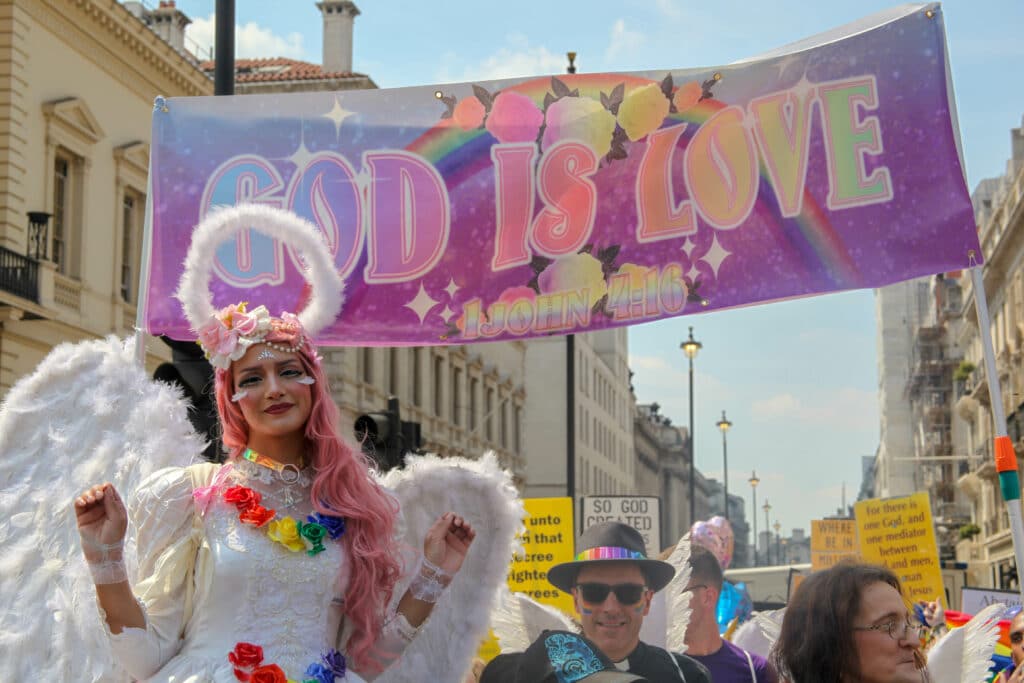 LGBT+ Christians at Pride in London, 2018, with a banner that reads: "God is love"