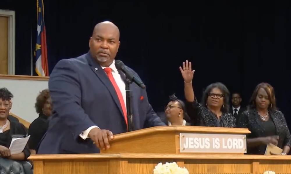 North Carolina's lieutenant governor Mark Robinson is seen speaking before people gathered at the Upper Room Church of God in Christ in August