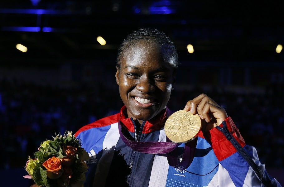 Nicola Adams poses with her gold medal at the 2012 London Olympic Games