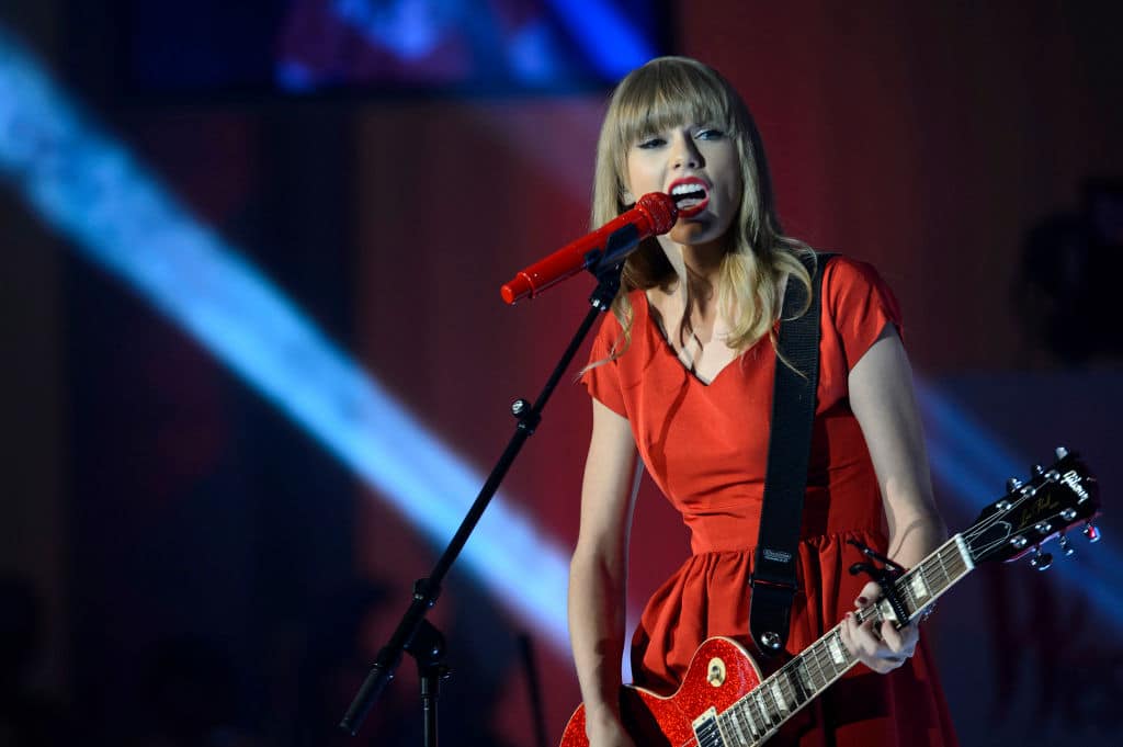 Taylor Swift performs live after switching on the christmas lights at Westfield London, White City/Shepherd's Bush in 2012.
