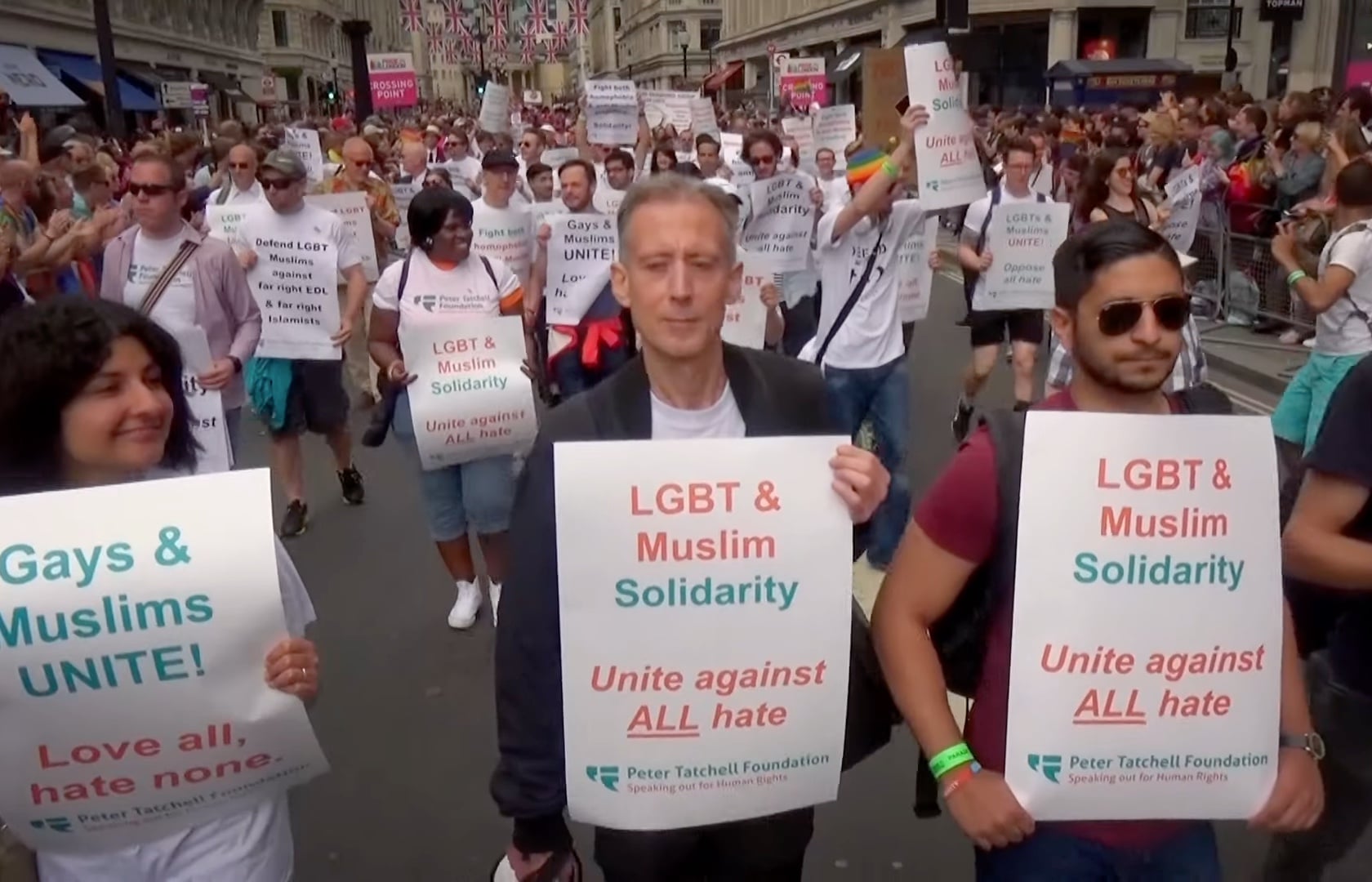 Peter Tatchell marching for LGBT+ and Muslim rights. 