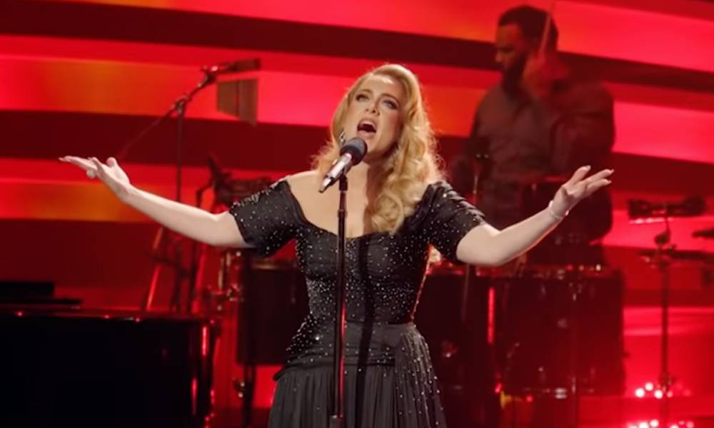 Adele performs in front of crowds at the London Palladium