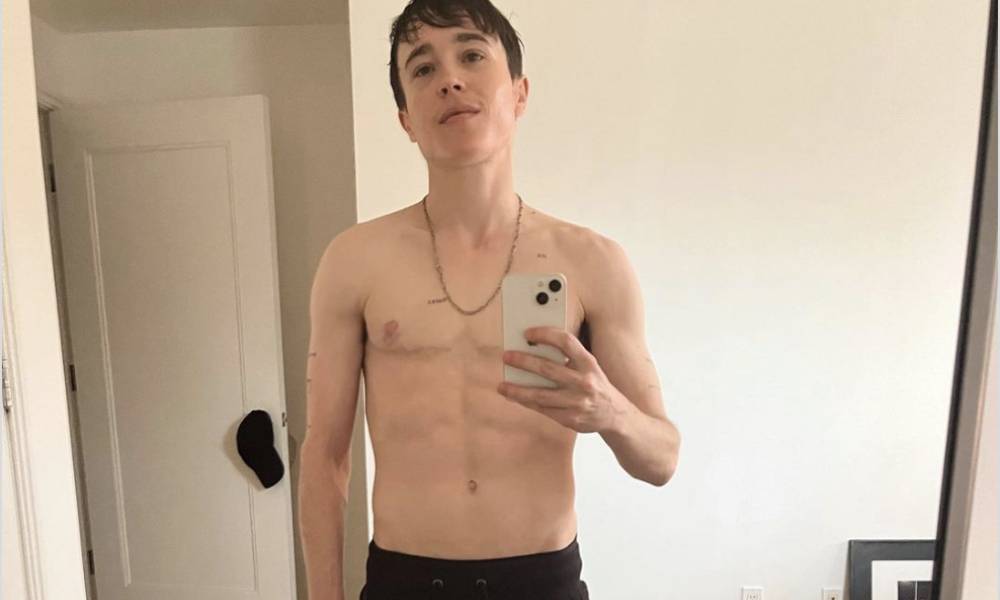 Elliot Page taking a topless mirror selfie
