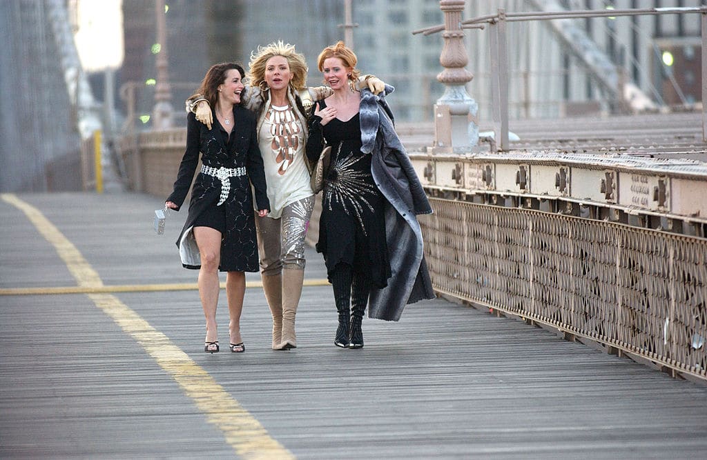 Kristin Davis, Kim Cattrall and Cynthia Nixon doing a promo shoot for Sex and the City. 