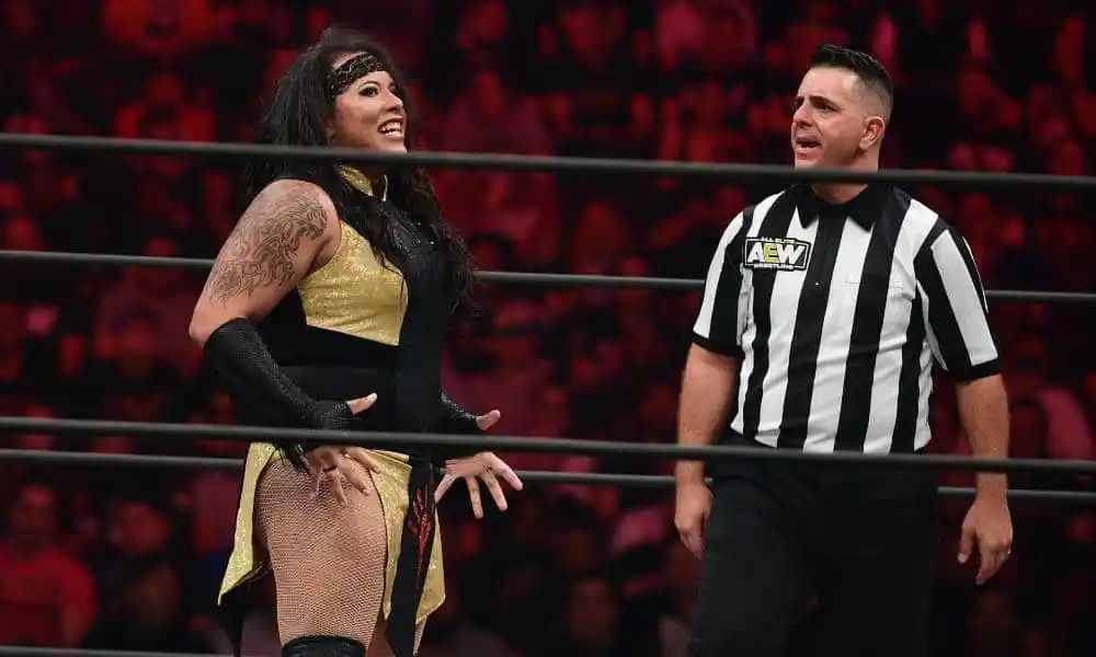 Nyla Rose is seen in the ring with a ref during an AEW tournament