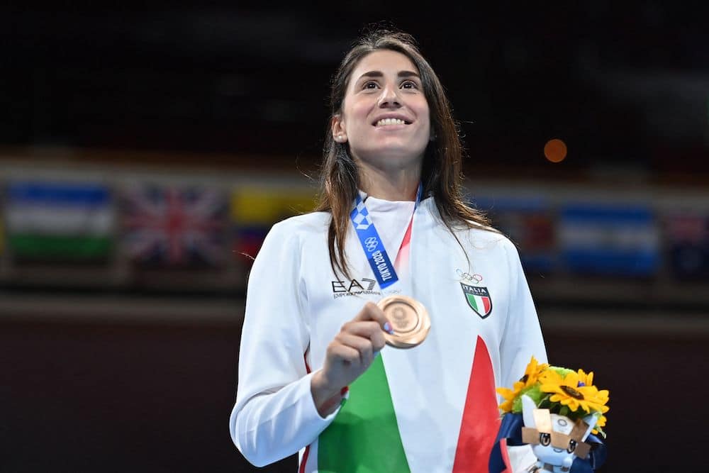 Bronze medallist Italy's Irma Testa poses on the podium with her medal