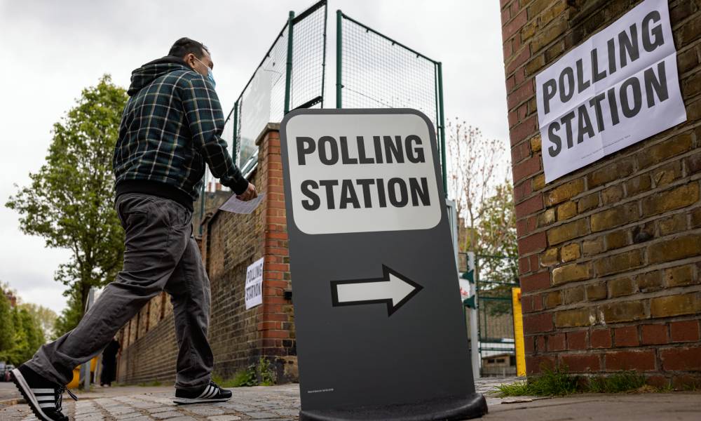 A man walks into a polling station
