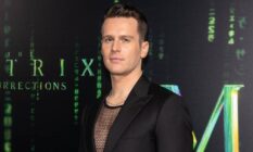 Jonathan Groff arrived at the Matrix Resurrections in a black fishnet shirt and a black suit jacket