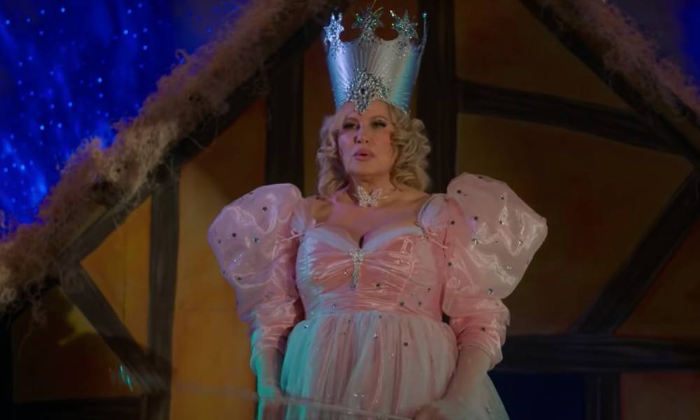 Jennifer Coolidge appears in a fairy costume during a holiday play in the Netflix gay romcom Single All the Way