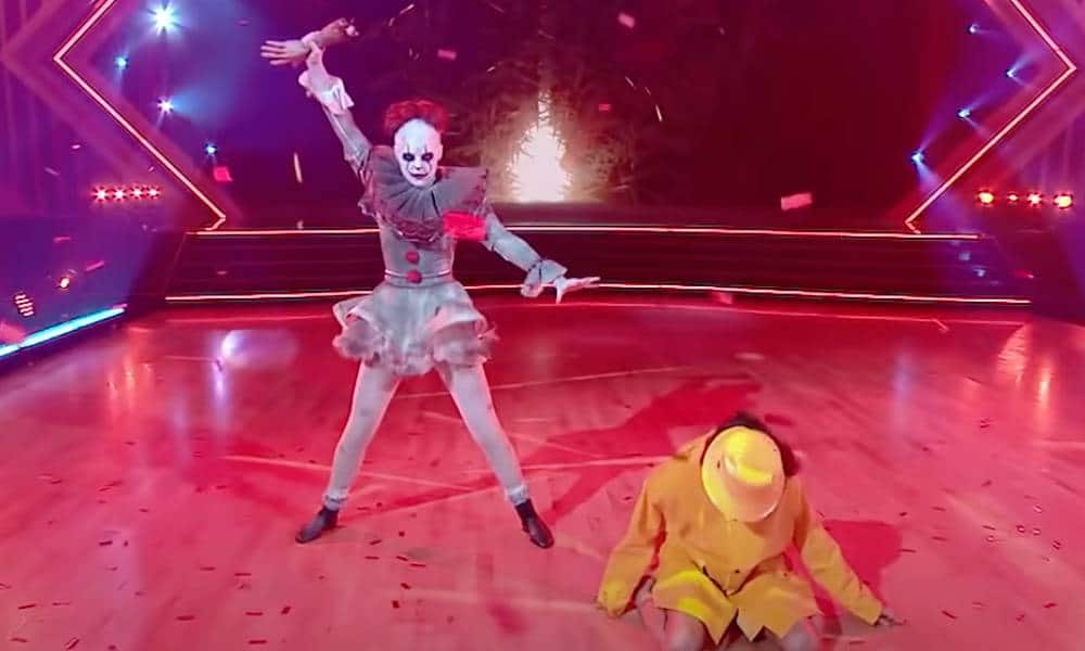 JoJo Siwa performs a jazz routine on Dancing with the Stars, while she is Pennywise from It.  is disguised