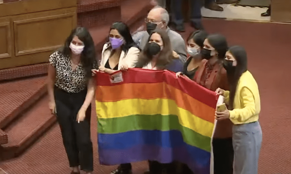 Members of Chile's congress pose for a photo after the historic same-sex marriage vote