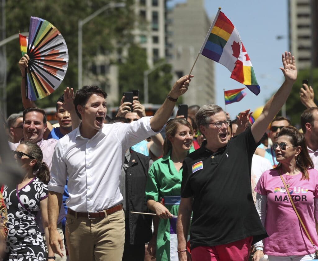 Canadian prime minister Justin Trudeau and Toronto mayor John Tory march at Toronto Prid