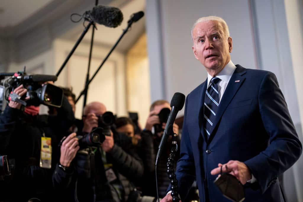 Joe Biden speaks to the press after attending a meeting with the Senate Democratic Caucus on Capitol Hill, on Thursday, Jan. 13, 2022. 