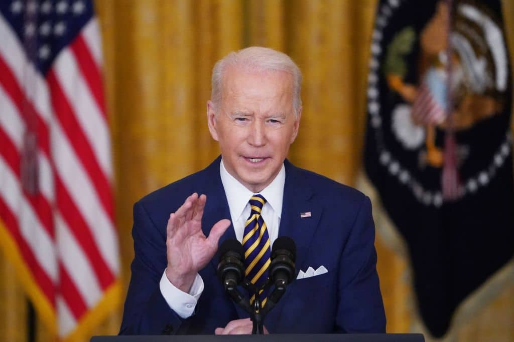 US President Joe Biden speaks during a press conference on the eve of his first year in office.
