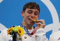 Tom Daley pictured after winning gold at the Olympics
