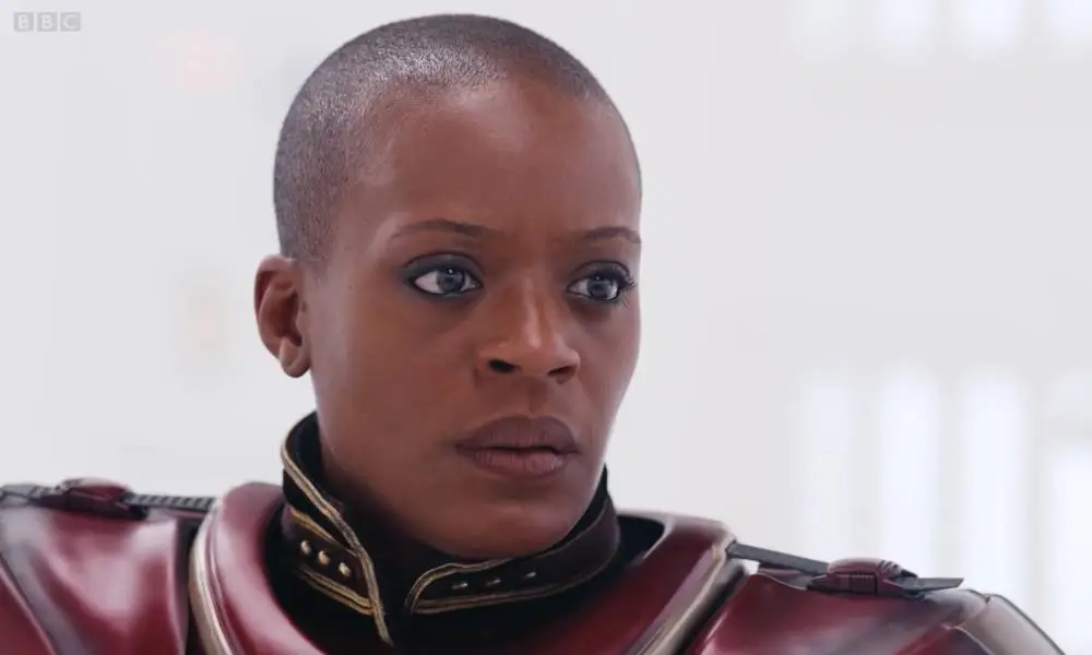 T'Nia Miller is dressed in dark red armour as she plays the General in Doctor Who