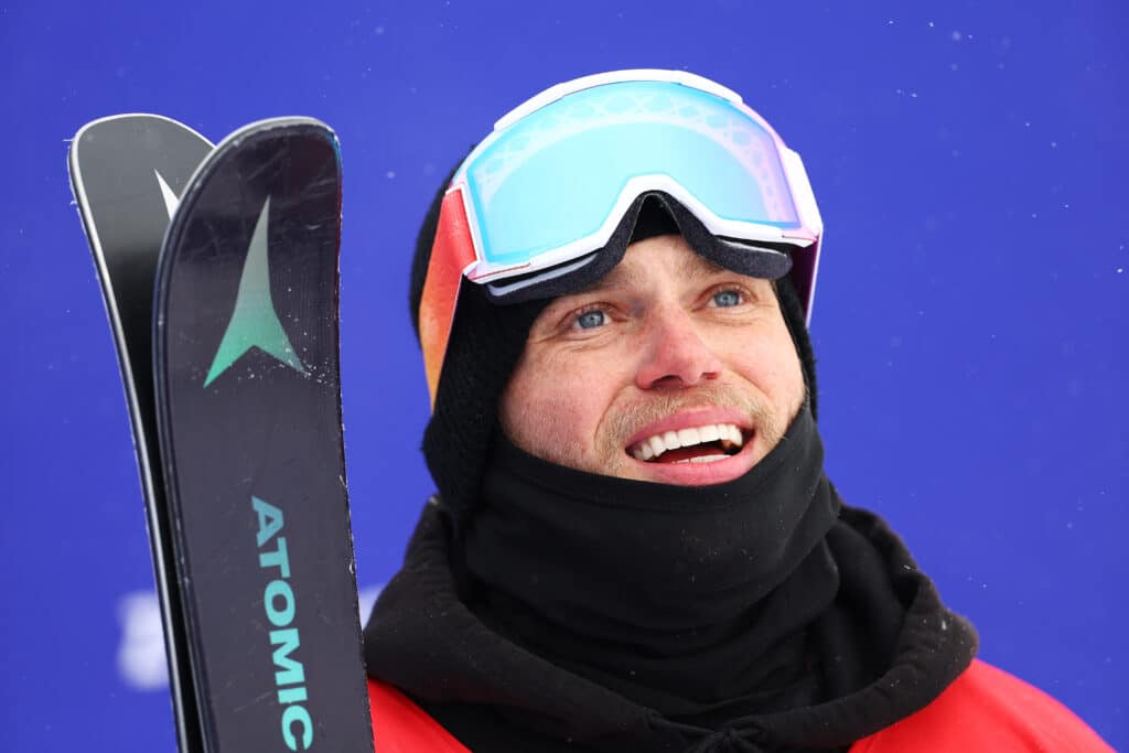 Gus Kenworthy of Team Great Britain reacts after their first run during the Men's Freestyle Skiing Freeski Halfpipe Qualification on Day 13 of the Beijing 2022 Winter Olympics