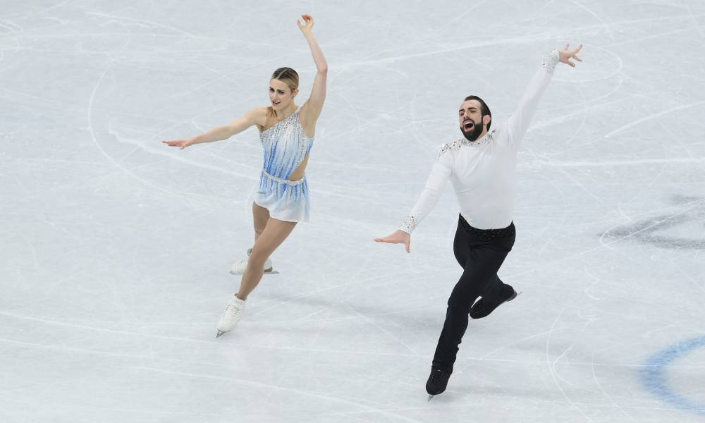 Team USA's Timothy LeDuc and Ashley Cain-Gribble skate during the 2022 Beijing Winter Olympics