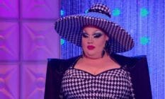 Eureka, a competitor on drag competition RuPaul's Drag Race, wears a black and white patterned outfit and hat