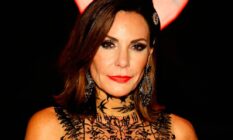 Luann de Lesseps, who appeared on the Real Housewives of New York City, wears a black lacy outfit during a Halloween ball