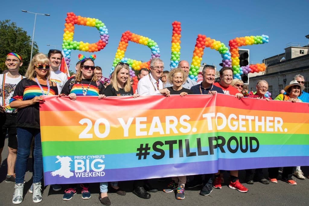 The head of the Pride Cymru parade including First Minister for Wales Mark Drakeford, Christina Rees MP and Stephen Doughty MP.