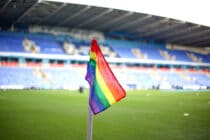 A rainbow Pride corner flag