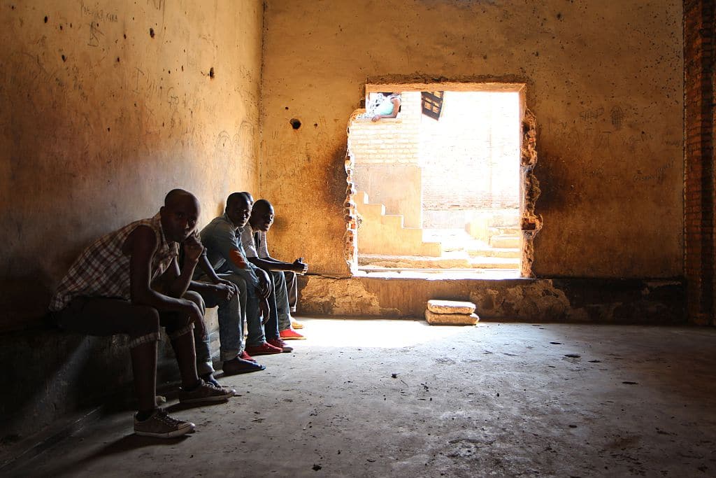 Rwandans sit in the Gikondo Transit Center in 2015.
