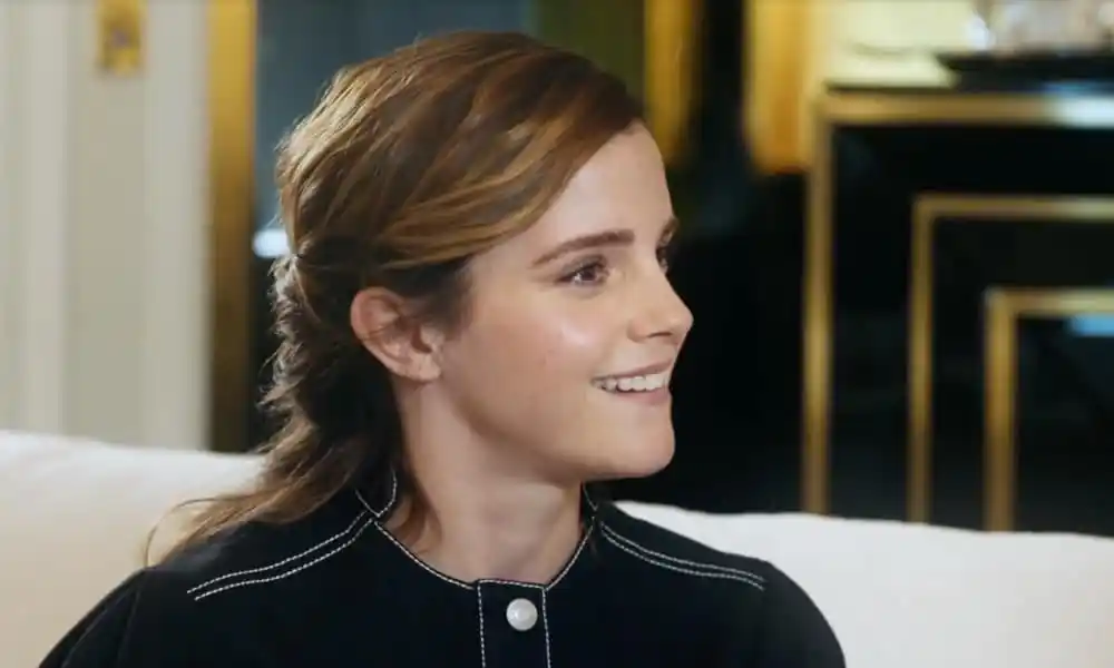 Emma Watson smiles while being interviewed