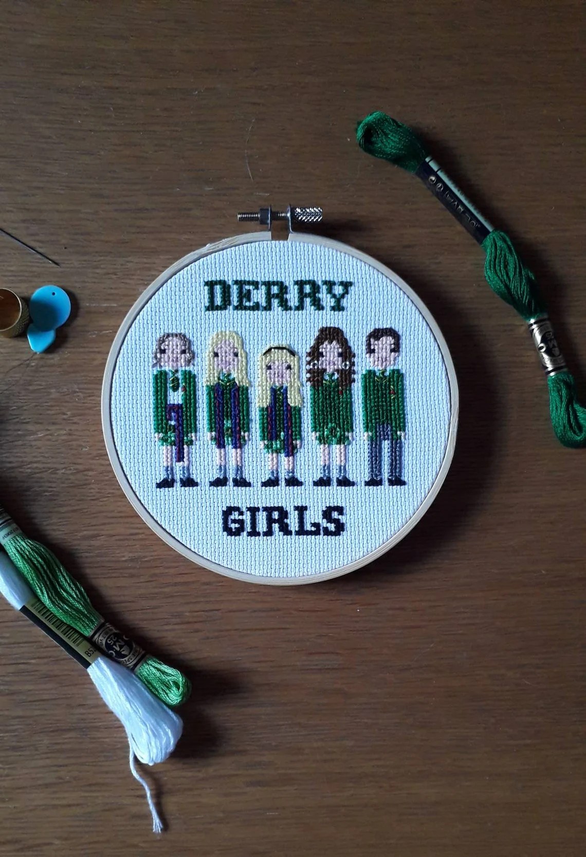 A Derry Girls cross stitch. (KnottySewandSew/Etsy)