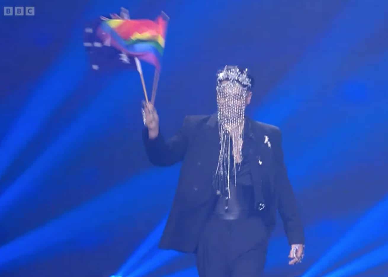 Australia's Sheldon Riley brought a Pride flag on stage. 
