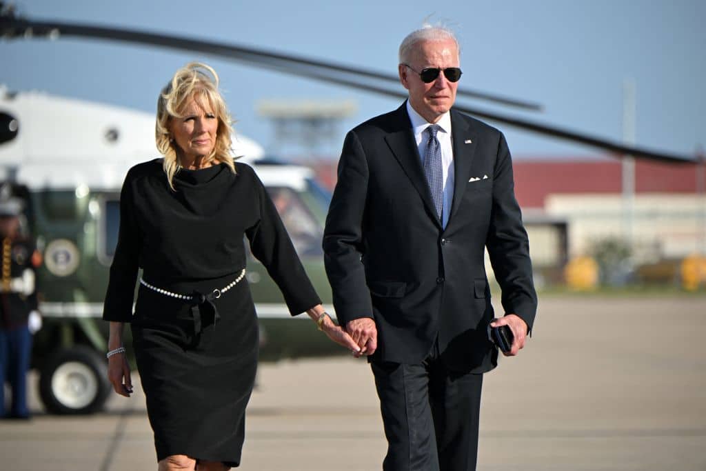 US President Joe Biden and First Lady Jill Biden walk to board Air Force One before departing Kelly Field in San Antonio, Texas on May 29, 2022. 