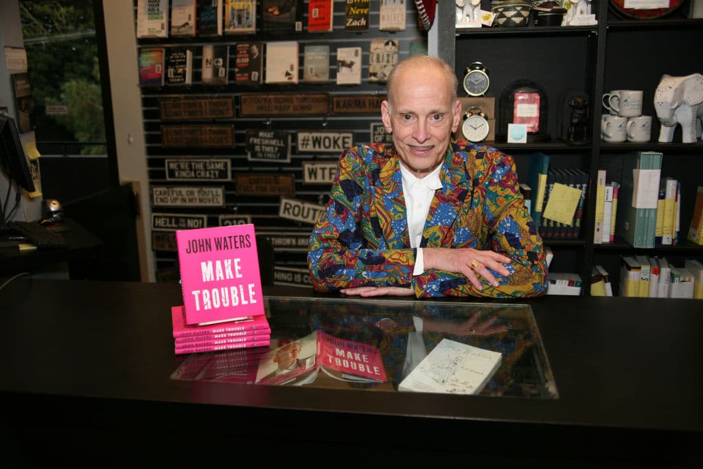 John Waters poses for a portrait at his book signing for his book Make Trouble. 
