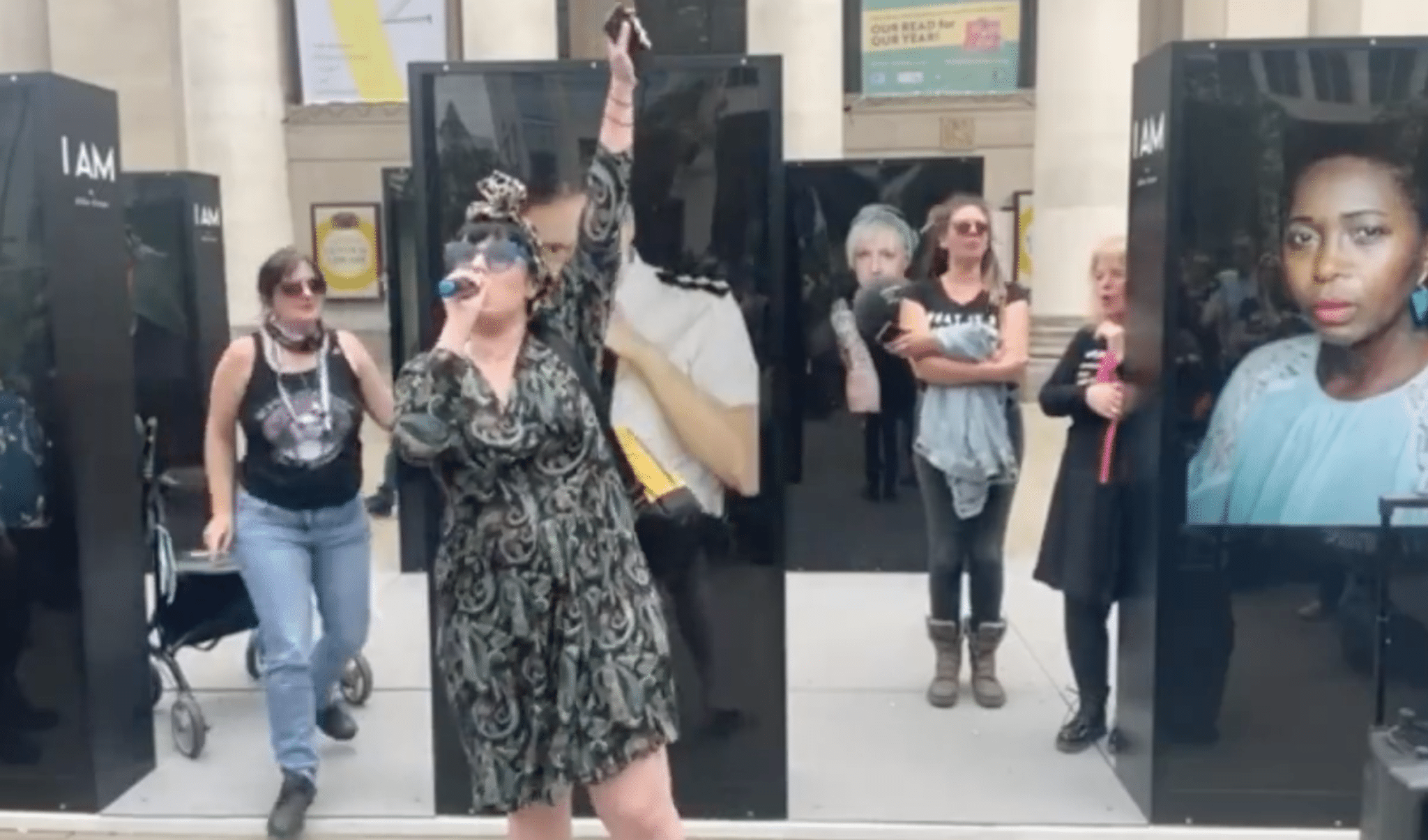 Cis woman interrupts feeble anti-trans protest and instantly becomes an icon