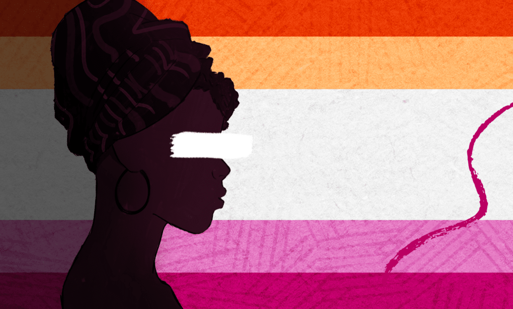 Silhouette of a woman in front of the lesbian flag