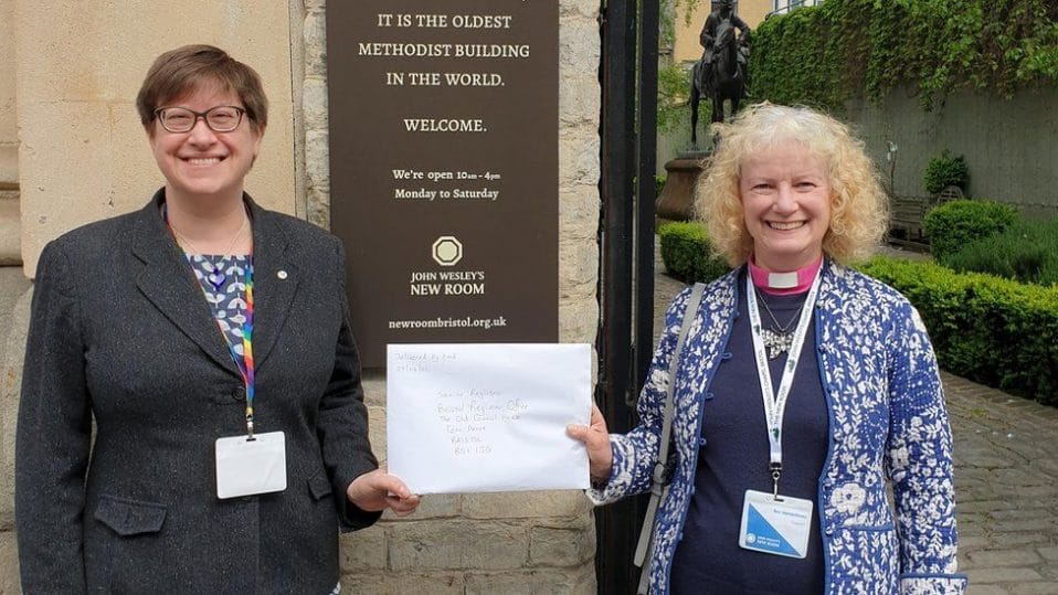 Rev. Mandy Briggs (left) and Rev. Josette Crane (right) with our application to the General Register Office