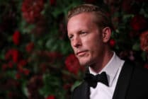 Laurence Fox posing for the 65th Evening Standard Theatre Awards
