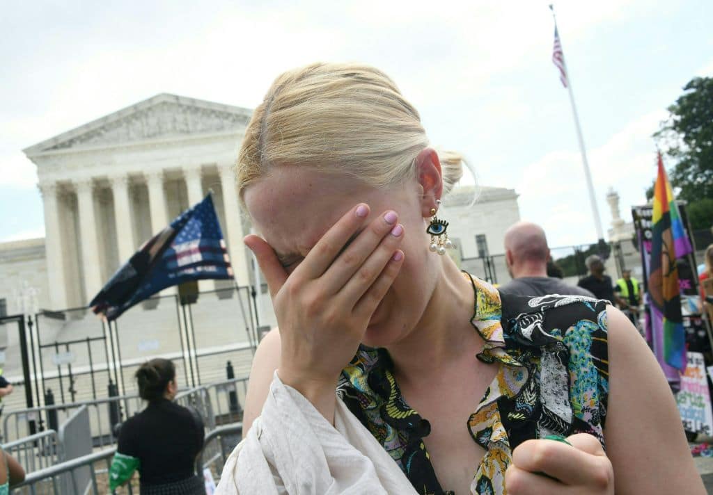 A pro-choice supporter cries outside the US Supreme Court in Washington, DC, on June 24, 2022.